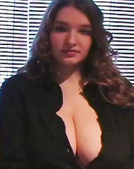 Shy busty teen showing off her huge natural tits
